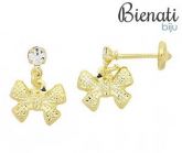 BO2521 - Brinco infantil folheado a ouro contendo pedra de strass e pingente em forma de um lacinho
