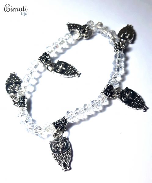 PU055 - Pulseira Pedrinhas na cor Cristal com Pingente de Coruja