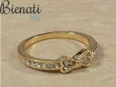 Cód. AN017 - Anel dourado com strass e detalhe de laço